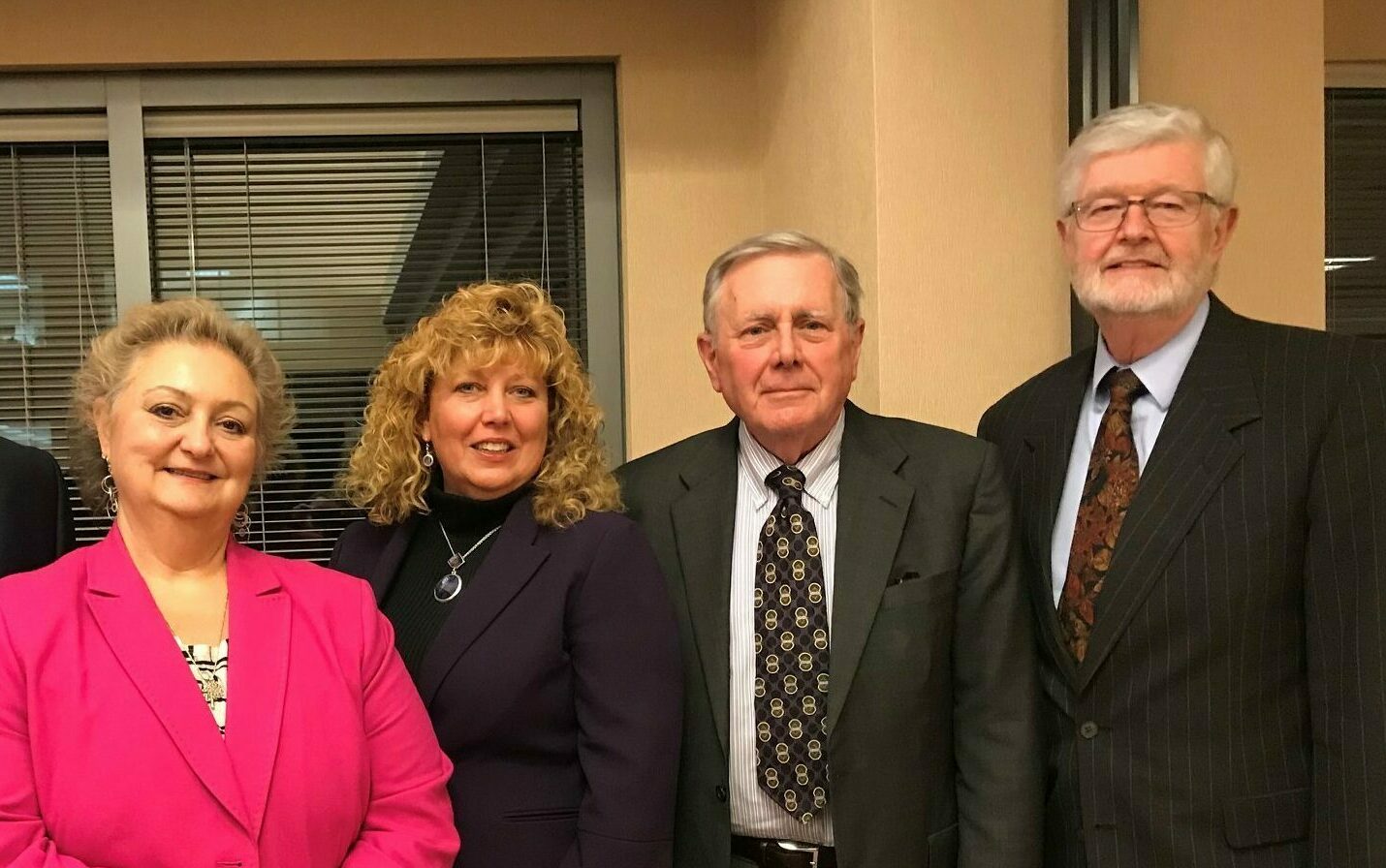 group photo of board members Carla Palumbo, Bruce Lawrence and David Schraver with Foundation Executive Deborah Auspelmyer