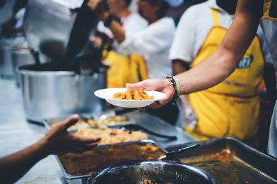 image of food being served in cafeteria line