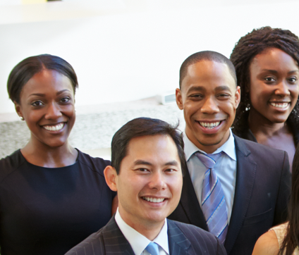 group photo of men and women in business attire